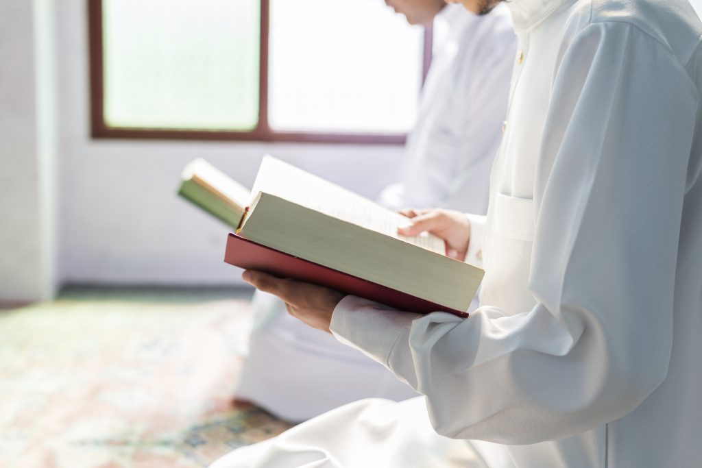 Muslims reading from the quran